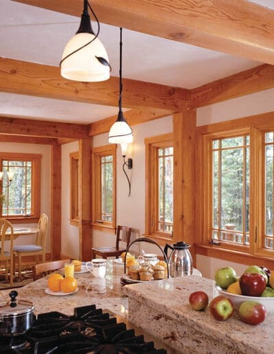 Interior view of the kitchen looking out to dining room in the Contemporary Cottage