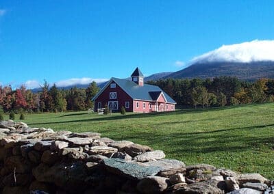 Vermont Wedding Barn set beyond stone wall