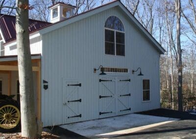 White barn with classic barn style doors