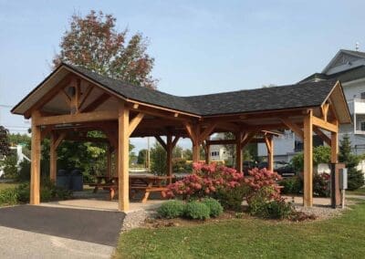 Pavilion with pink flowers and landscaping finished