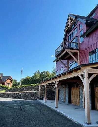 Red barn with cupola and timber frame accents